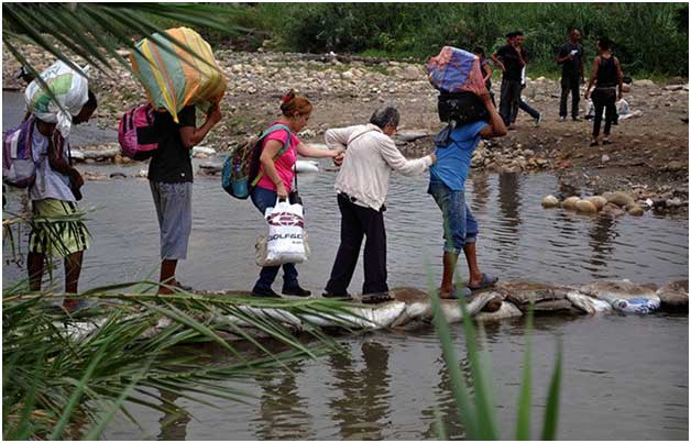 Colombia otorga a casi un millón de migrantes venezolanos el estatus legal y el derecho al trabajo